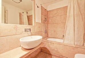 Combined shower/bathtub