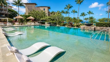 Outdoor pool, pool umbrellas, sun loungers