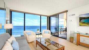 Condo (1 Bedroom - MAH-1006) | Living room | 55-inch TV with digital channels