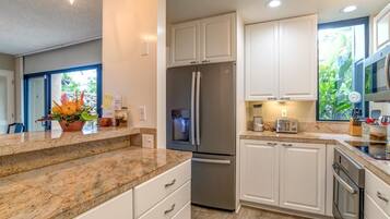 Condo (2 Bedrooms) | Private kitchen | Fridge, microwave, oven, coffee/tea maker