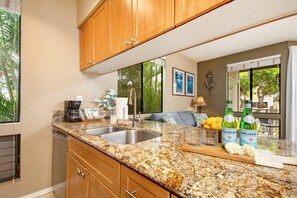 Condo (1 Bedroom) | Private kitchen | Microwave, oven, coffee/tea maker, electric kettle