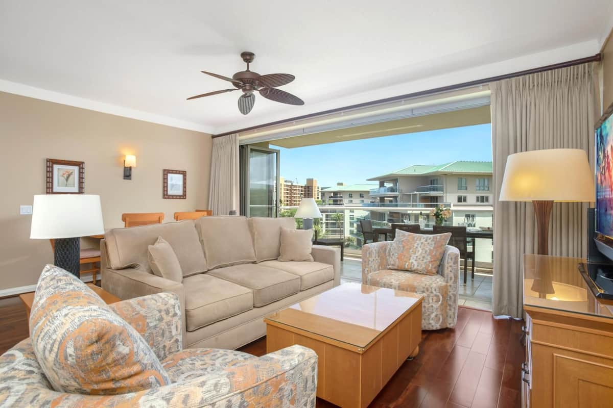 Condo (2 Bedrooms) | Living room | 55-inch flat-screen TV with digital channels