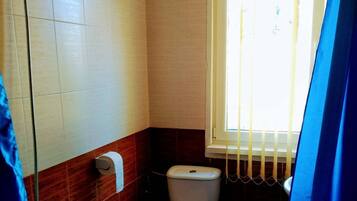 Dutxa, assecador de cabells, tovalloles i sabó