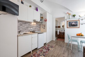 Fridge, stovetop, electric kettle, toaster