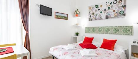 1 habitación, tabla de planchar con plancha y wifi