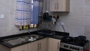 Fridge, microwave, oven, stovetop - Stay.Plus Kasarani Deluxe Apartment (Nairobi)