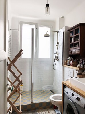 Shower, hair dryer, towels, soap