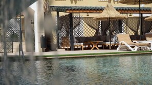 Outdoor pool, open 8:30 AM to 8:30 PM, free cabanas, pool umbrellas - HOTEL BLADI PALACE (Taghit)