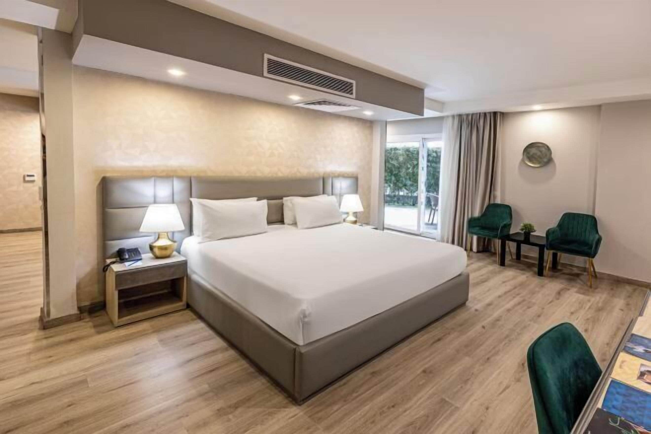 Premium bedding, pillow-top beds, minibar, desk