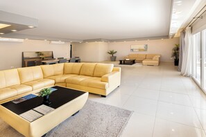 Luxury Apartment, 3 Bedrooms, Pool View | Living area | 32-inch Smart TV with digital channels, TV, offices - Ocean Blue Studios (Cairo)