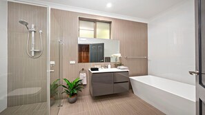 Bathtub, hair dryer, towels
