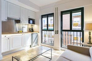 Mini-fridge, microwave, stovetop, cookware/dishes/utensils