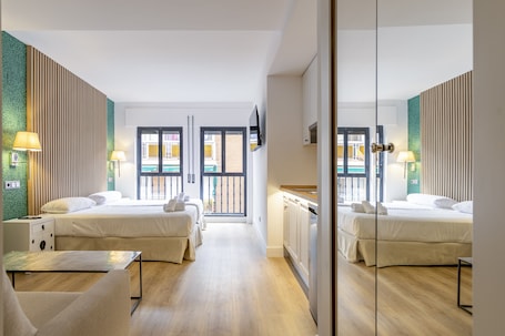 Free WiFi, bed sheets. Apartahotel Quo Eraso