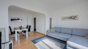 Standard Apartment, Multiple Bedrooms, Mountainside (Ca' Gina Panoramica - Monte Brè) | Living area | 21-inch TV with satellite channels, fireplace