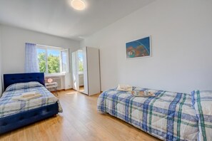 Apartamento estándar, varias habitaciones, junto a la montaña (Ca' Gina Panoramica - Monte Brè) | 2 dormitorios, wifi gratis, ropa de cama