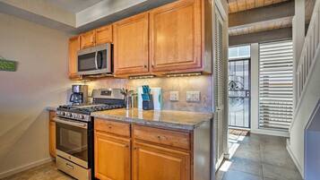 Condo, 2 Bedrooms | Private kitchen | Fridge, microwave, oven, dishwasher