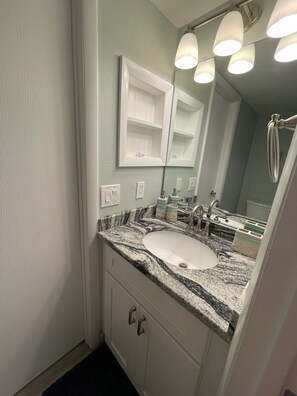 Combined shower/bathtub, hair dryer, towels - My Happy Place - Topsail Island Surf Condo 214 (Surf City)