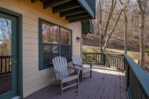 Relax on the porch with two Adirondack chairs.