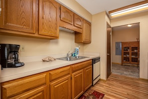 Enjoy cooking and dining in this well-equipped kitchen with dishwasher and coffee maker.