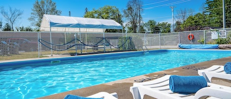 Seasonal outdoor pool, open 8:00 AM to 9:00 PM, pool umbrellas