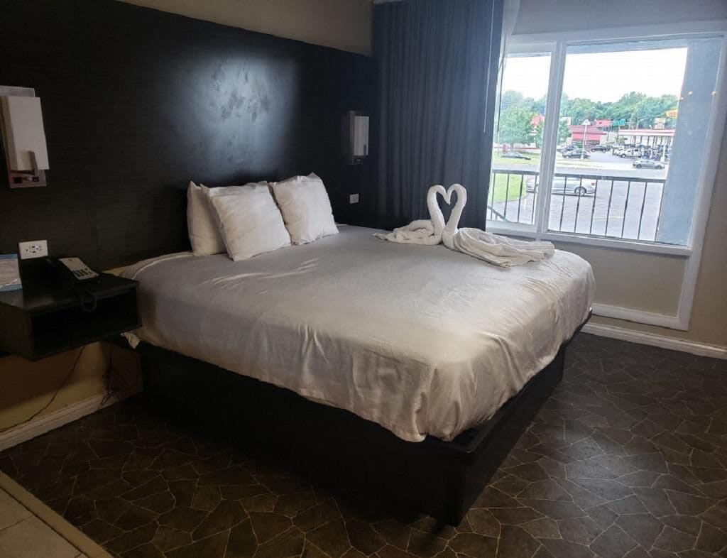 Heart Shape Jetted Tub King Bed at Envi Boutique Hotel