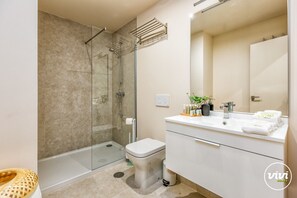 Bathtub, hair dryer, towels, soap