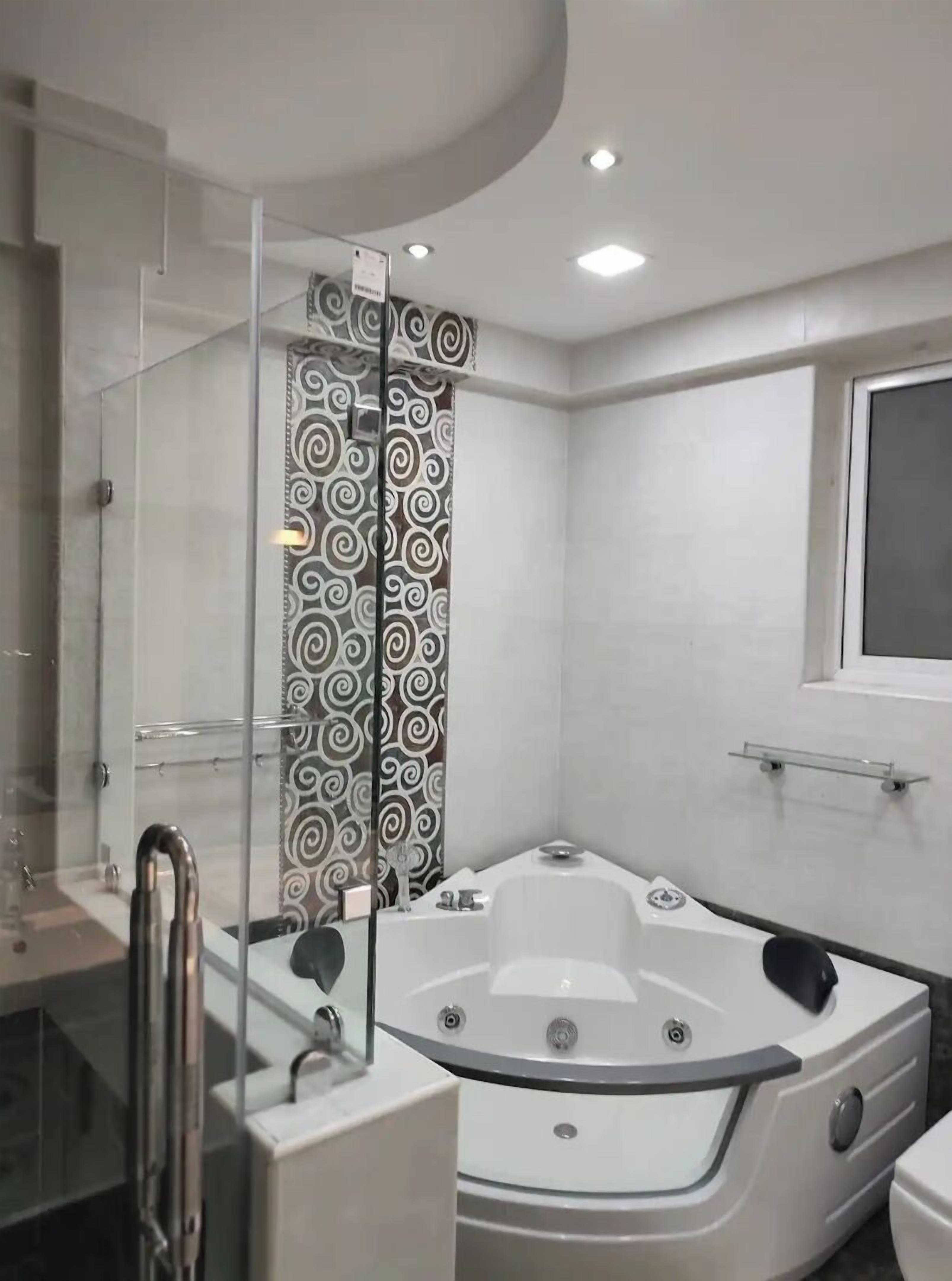Shower, towels, soap, toilet paper