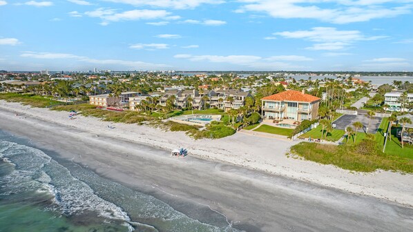 On the beach, sun loungers, beach towels
