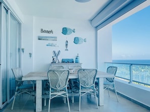 Outdoor dining - Ocean Front Vacation Rental Apartment 820 (Playa Juan Dolio)