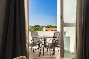 Family Room, Multiple Beds, Non Smoking, Pool View | Terrace/patio