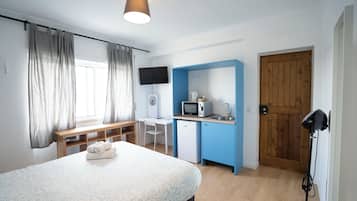 Suíte estúdio conforto, 1 cama de casal, para não fumantes, banheiro privativo | Roupas de cama premium, camas Select Comfort, escrivaninha
