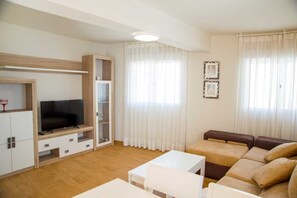 3 slaapkamers, een strijkplank/strijkijzer, beddengoed