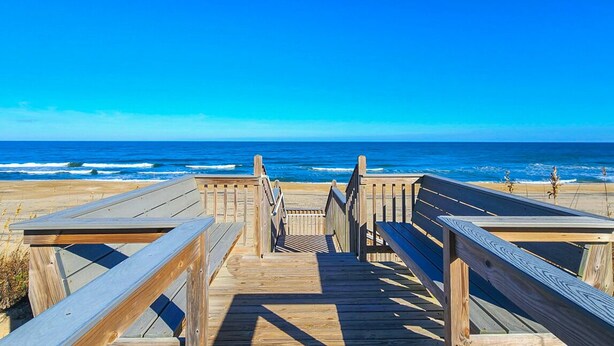 A wooden boardwalk leading to the beach with a clear view of the ocean. - Top Of THe Hill - High Dune location, 4 BR home w/Private Pool and Dogs Allowed (Southern Shores)