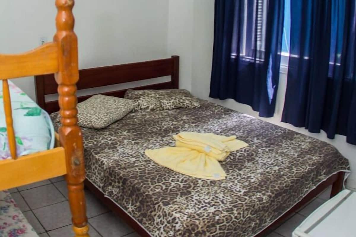 Economy Quadruple Room | Minibar, WiFi (free), bed sheets