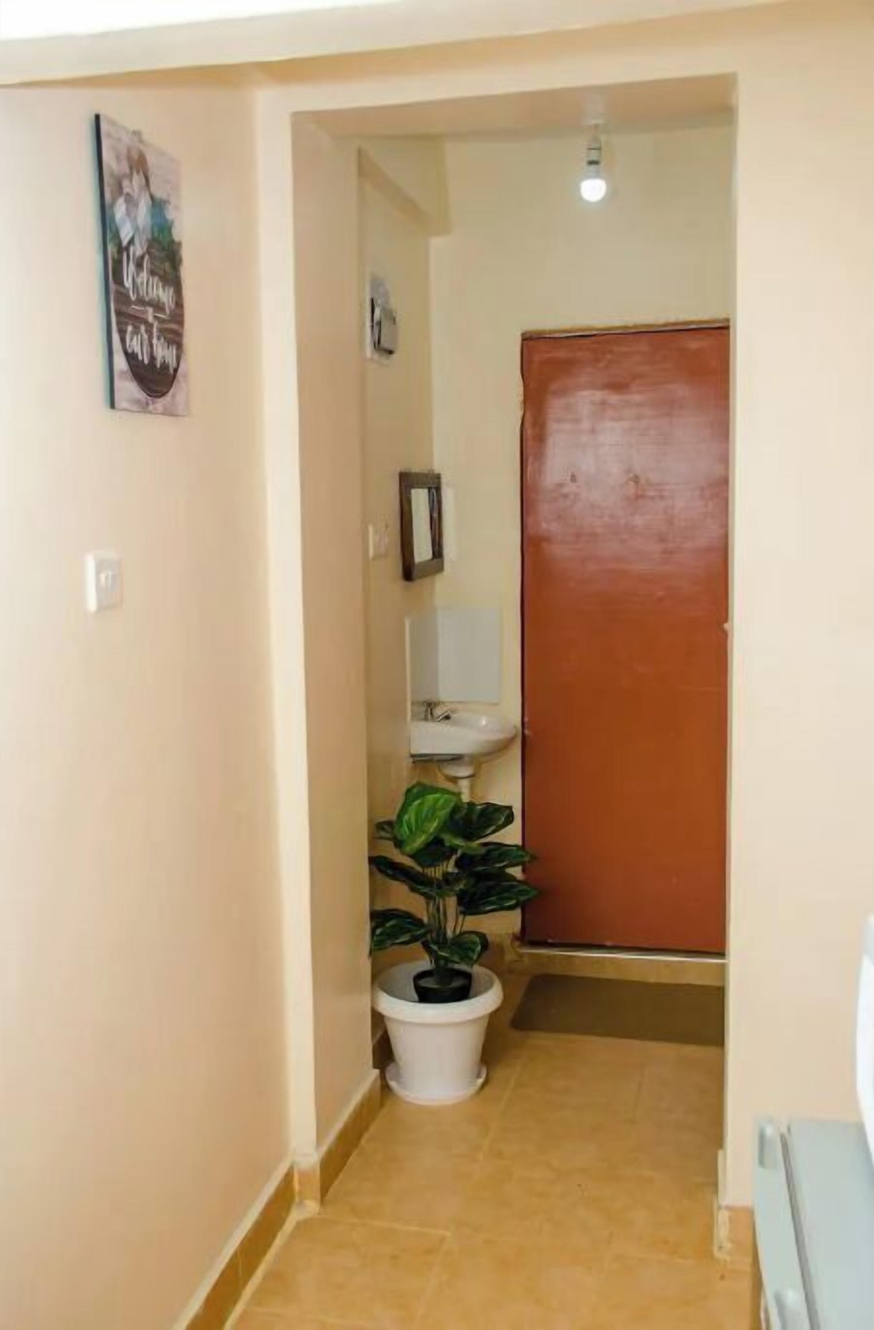 Bathtub, towels, soap, toilet paper