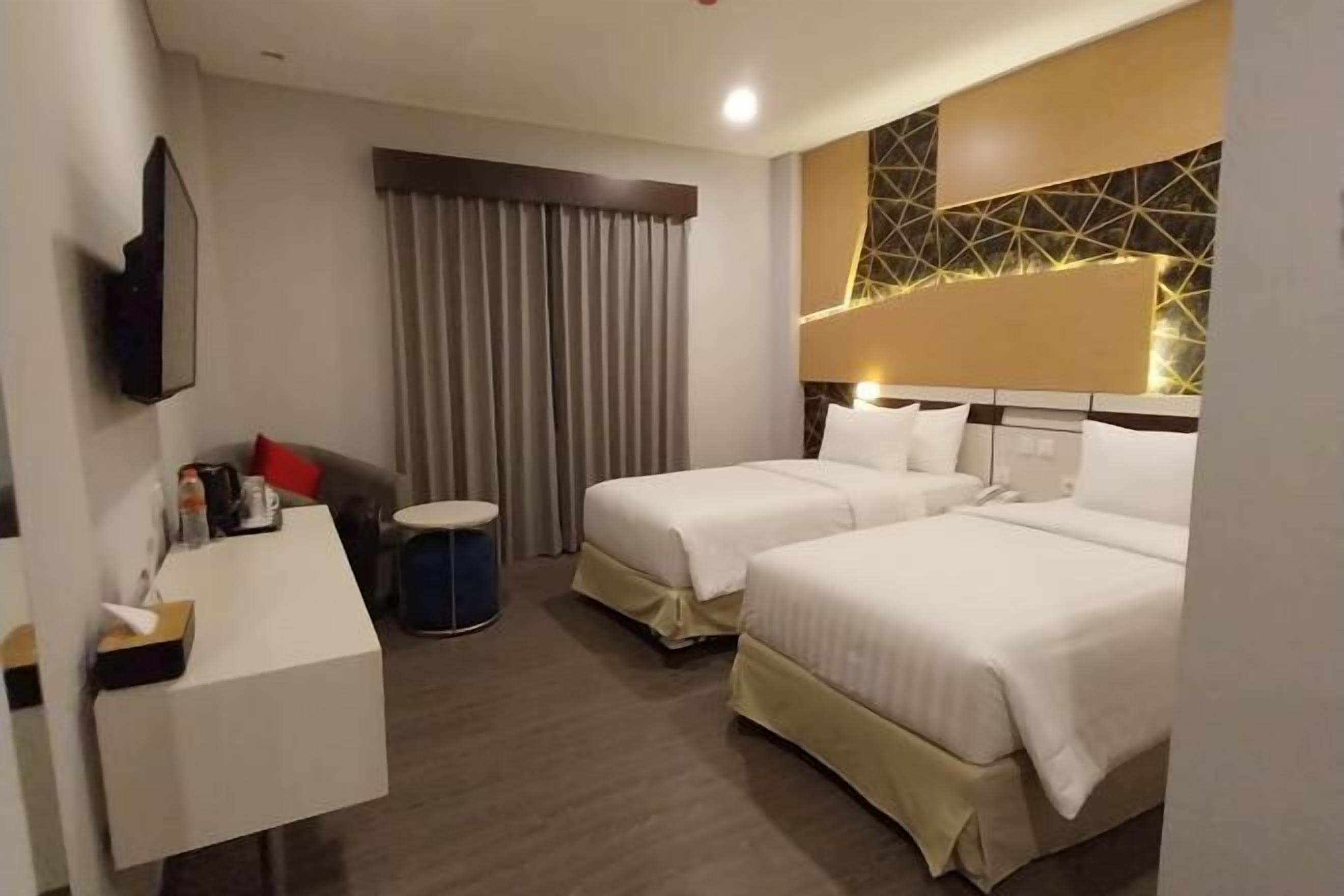 Literie hypoallergénique, coffres-forts dans les chambres, bureau