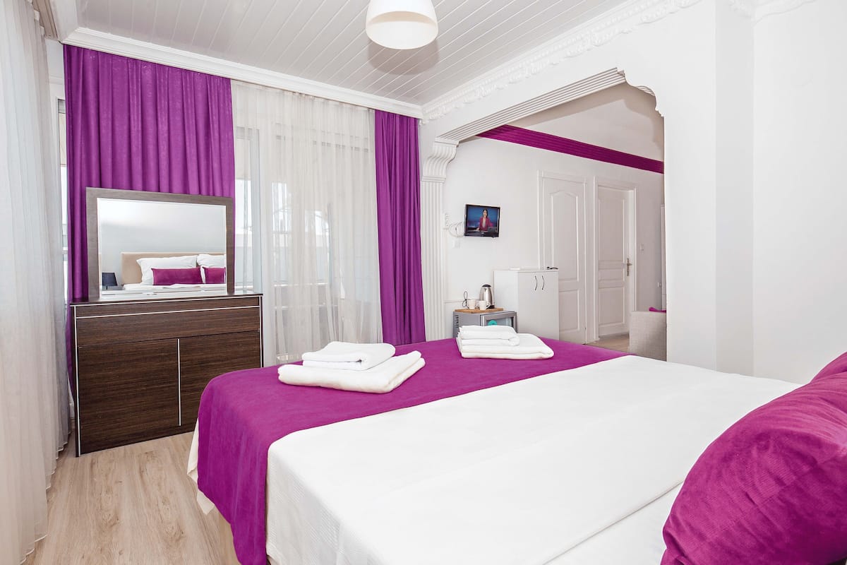 Suite estudio familiar | Sábanas de algodón egipcio, ropa de cama de alta calidad y minibar