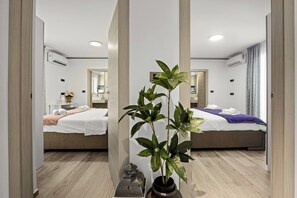 4 habitaciones, tabla de planchar con plancha y cuna de viaje 