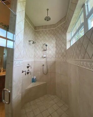 Bathtub, hair dryer, towels, soap