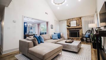 Smart TV, fireplace, foosball, books