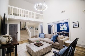 Smart TV, fireplace, foosball, books