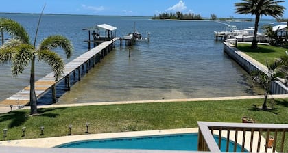 Waterfront Studio with pool and boat dock