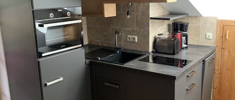Réfrigérateur, four, plaque de cuisson, lave-vaisselle