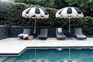 Outdoor pool, pool umbrellas, sun loungers