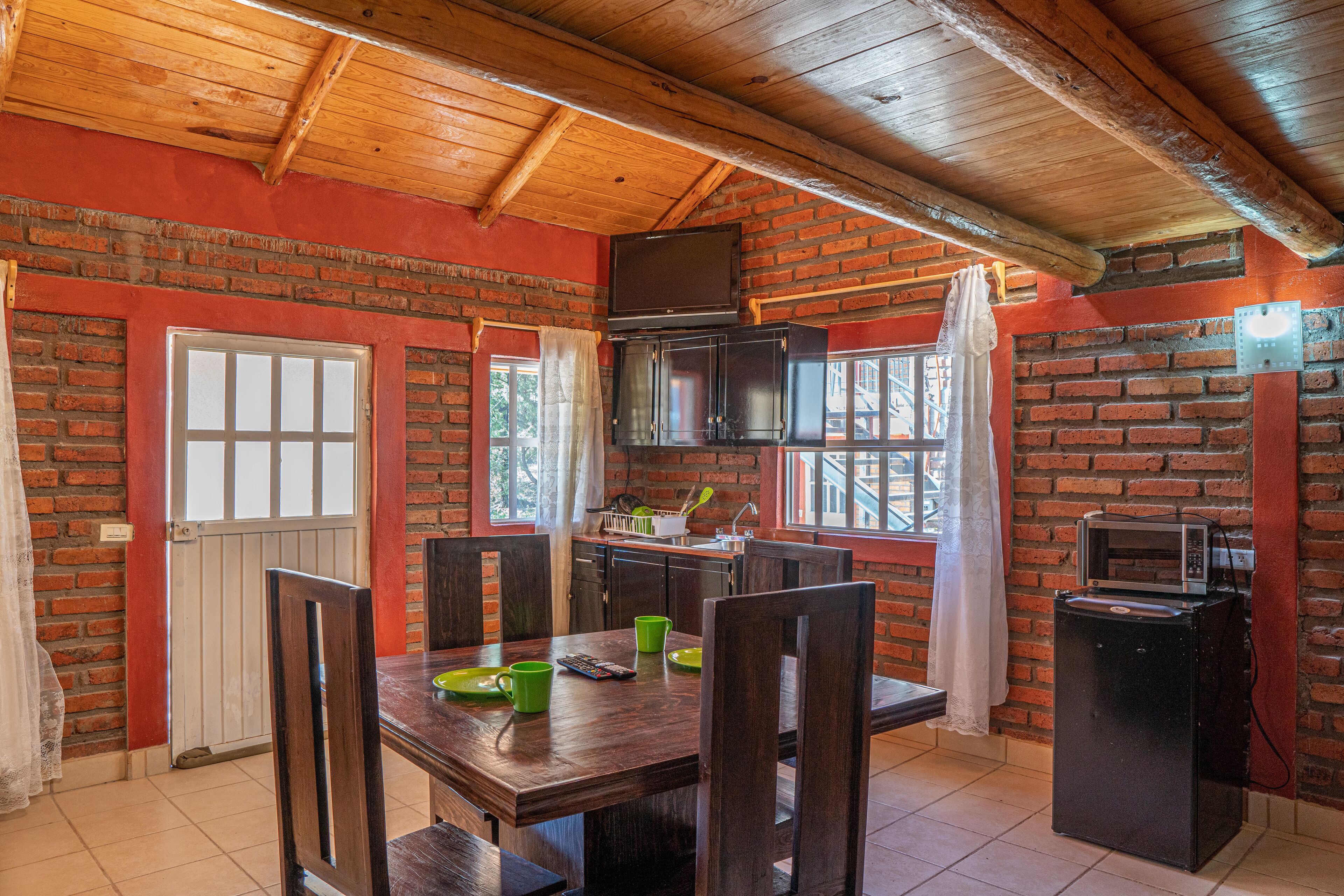 Microwave, dishwasher, cookware/dishes/utensils, cleaning supplies