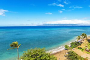 On the beach, sun loungers, beach towels