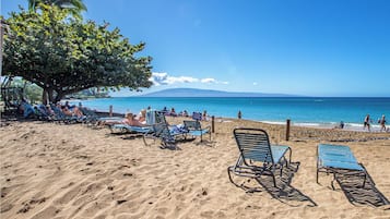 On the beach, sun-loungers, beach towels