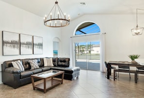 Relax in the open airy spacious living room after a day at the parks