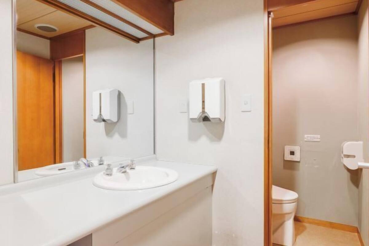 Bathroom | Hair dryer, slippers, electronic bidet, towels