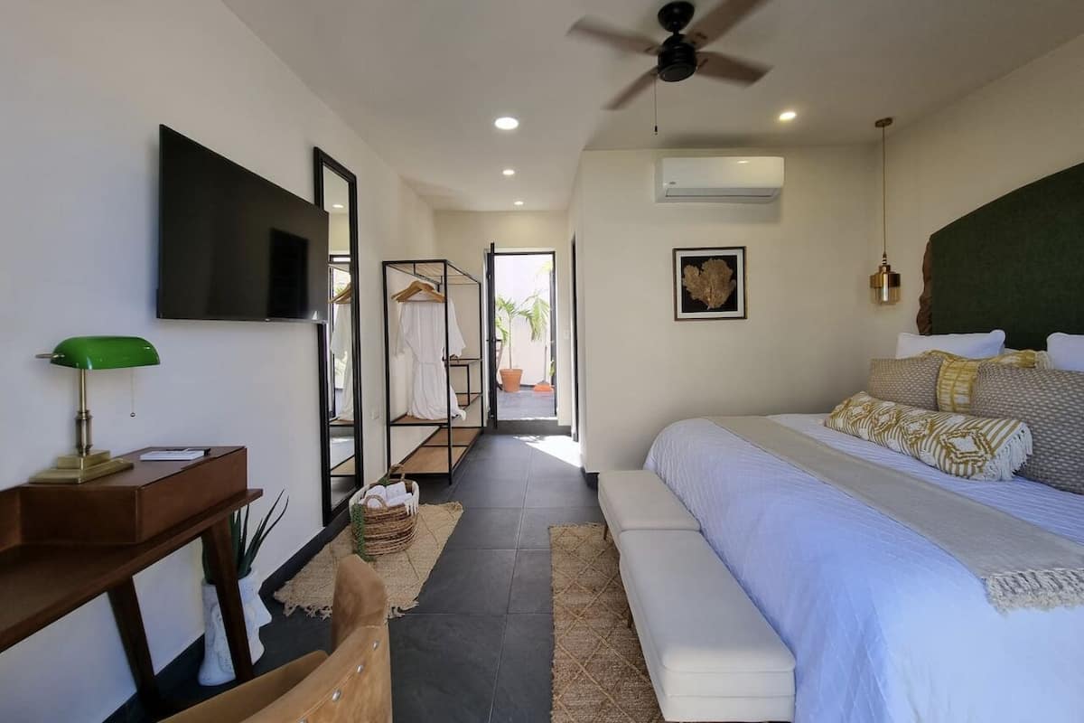Design Studio Suite | Premium bedding, down duvets, desk, laptop workspace